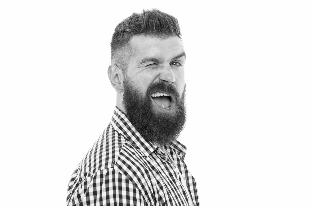 Hipster with mustache and beard happy face expression Happiness concept Psychological health Happy emotional guy Emotional intellect Happy man on white background Bearded man smiling